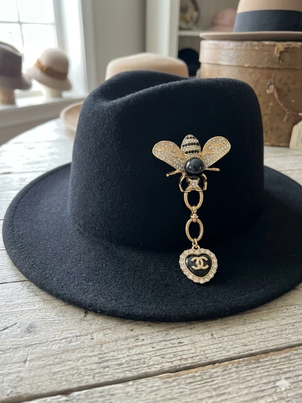 Gold Bee Brooch with Black Enamel Heart and Crystal Accents